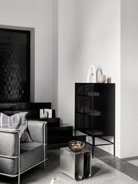 kristina dam Curved side table in raw steel Curved